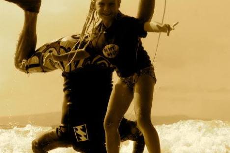 two surfers on one board