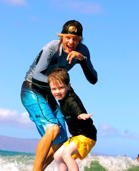 a man riding a surfboard in the water